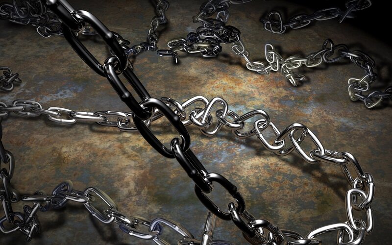 metal chains on rusty surface
