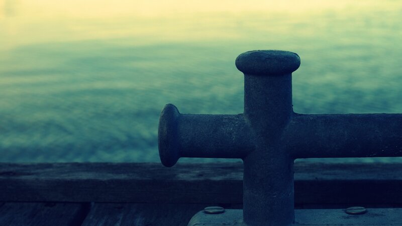metal cleat on wooden pier