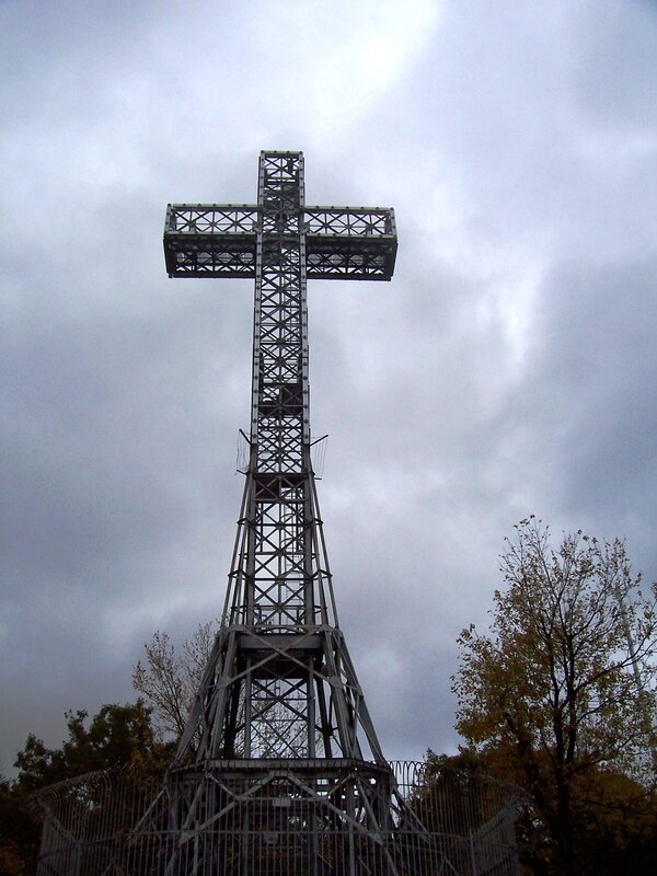 Metal cross on a cloudy day