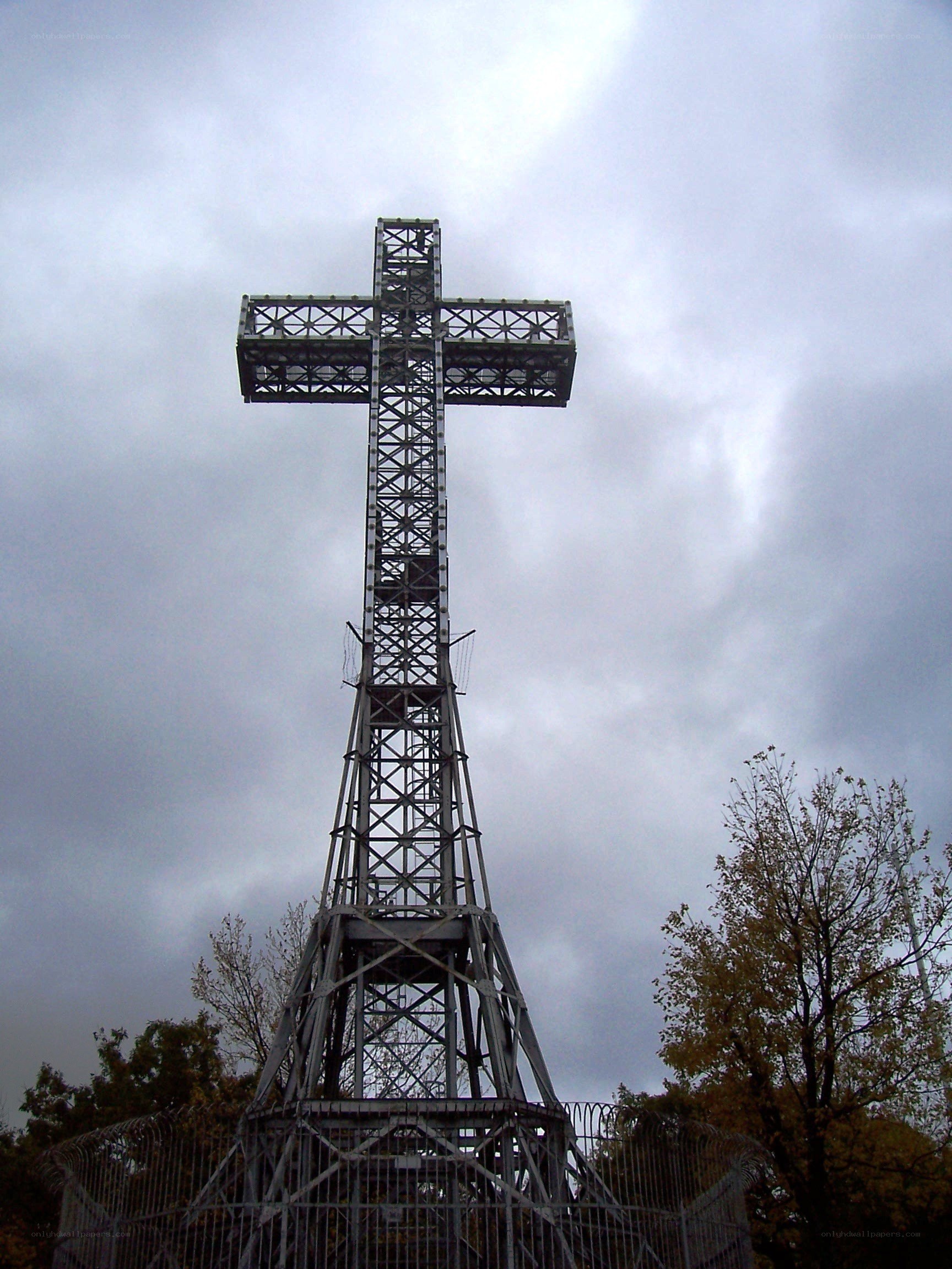 Metal cross on a cloudy day