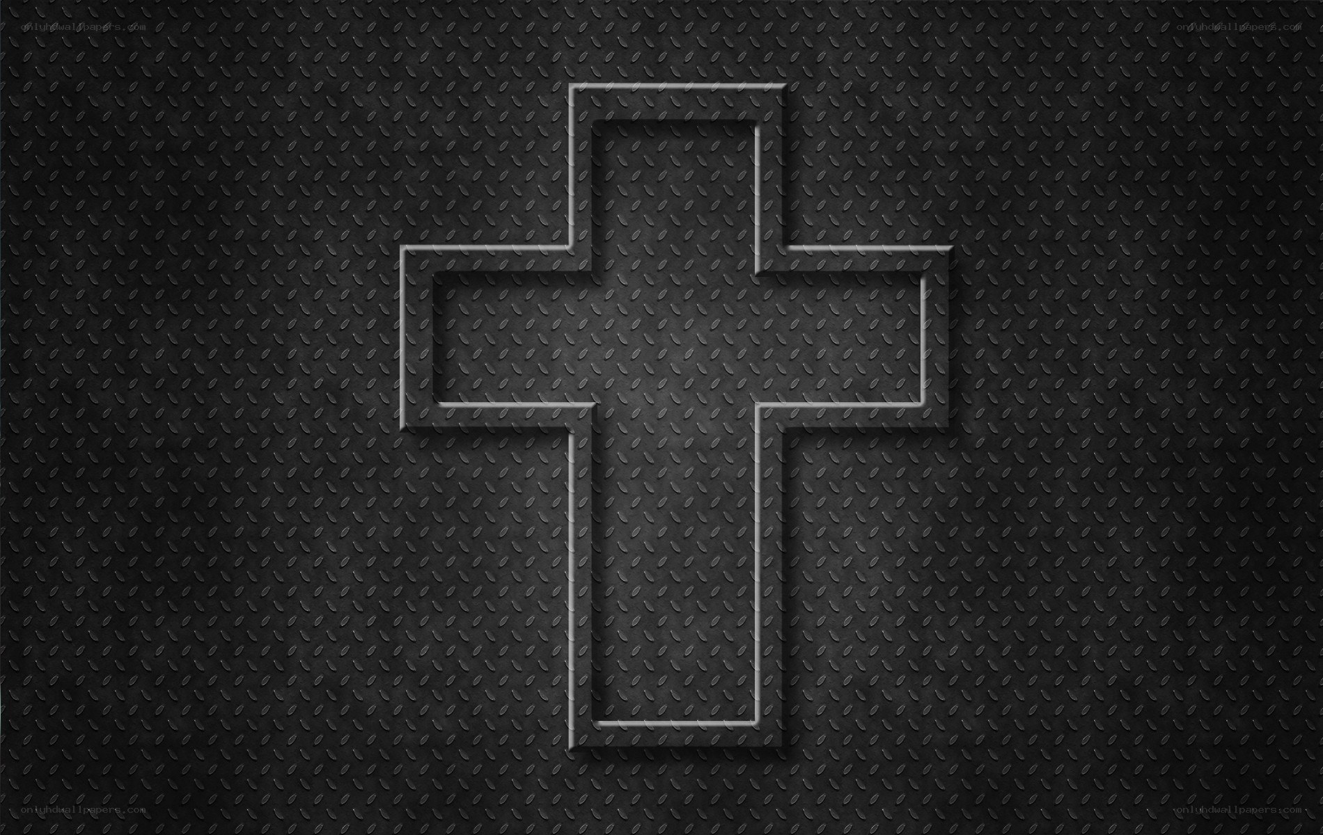 metal cross on textured background