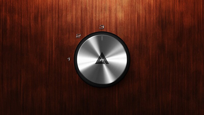 metal dial on wooden surface