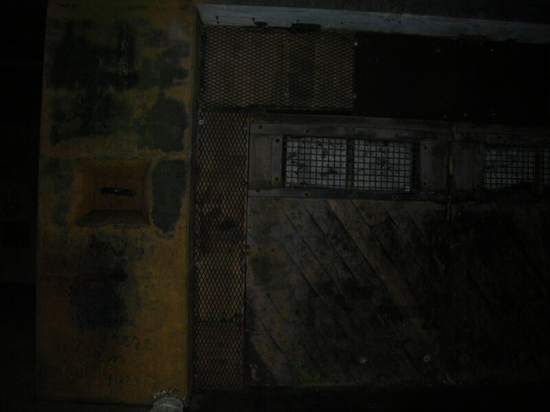 Metal Door in Dark Room
