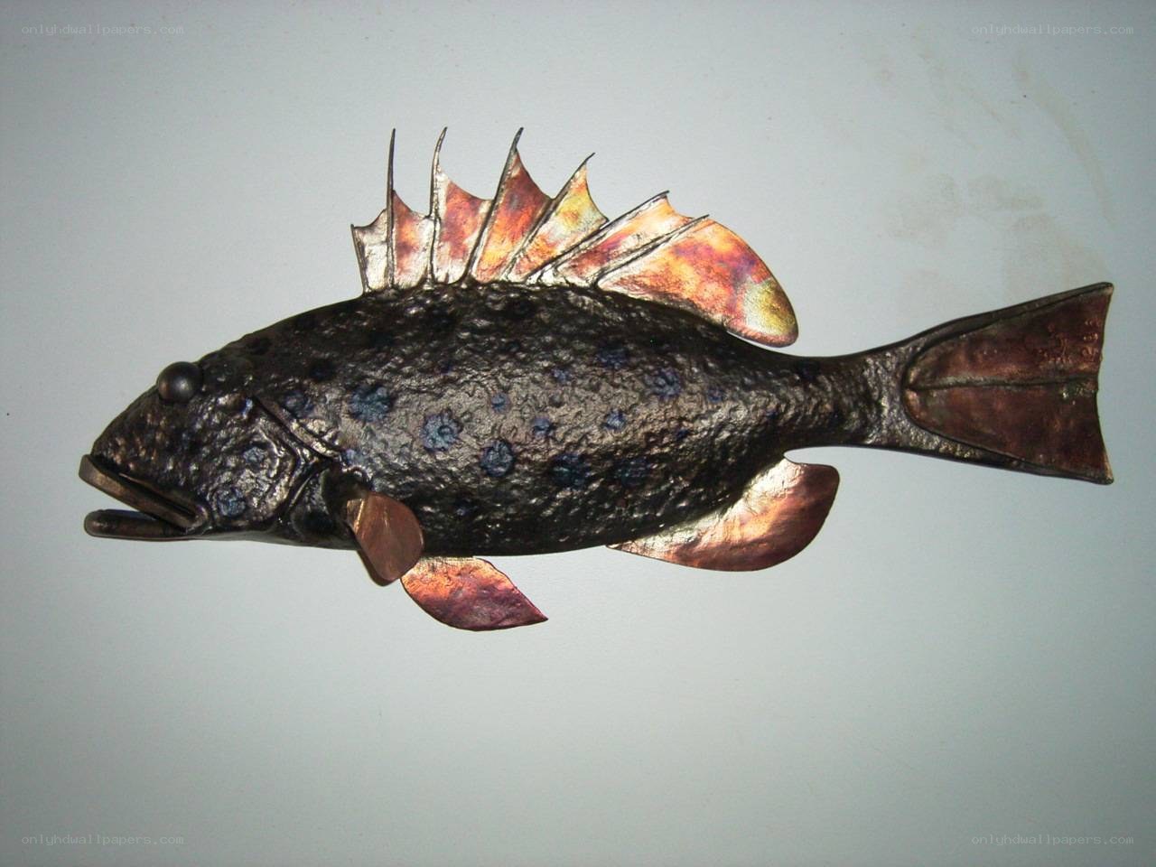 Metal fish sculpture