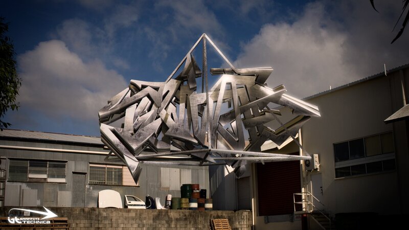 Metal graffiti sculpture outdoors