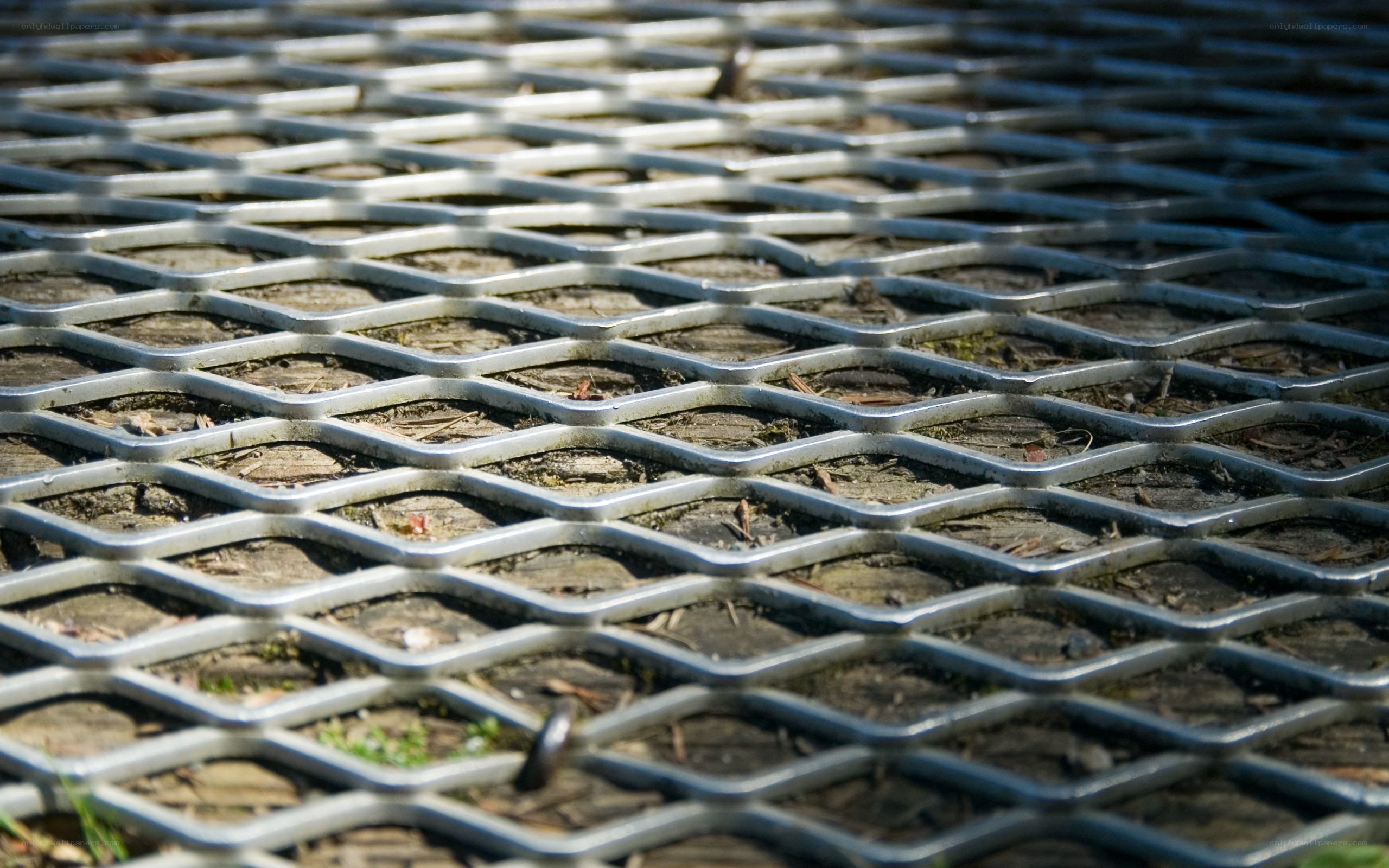 metal grate on wooden surface