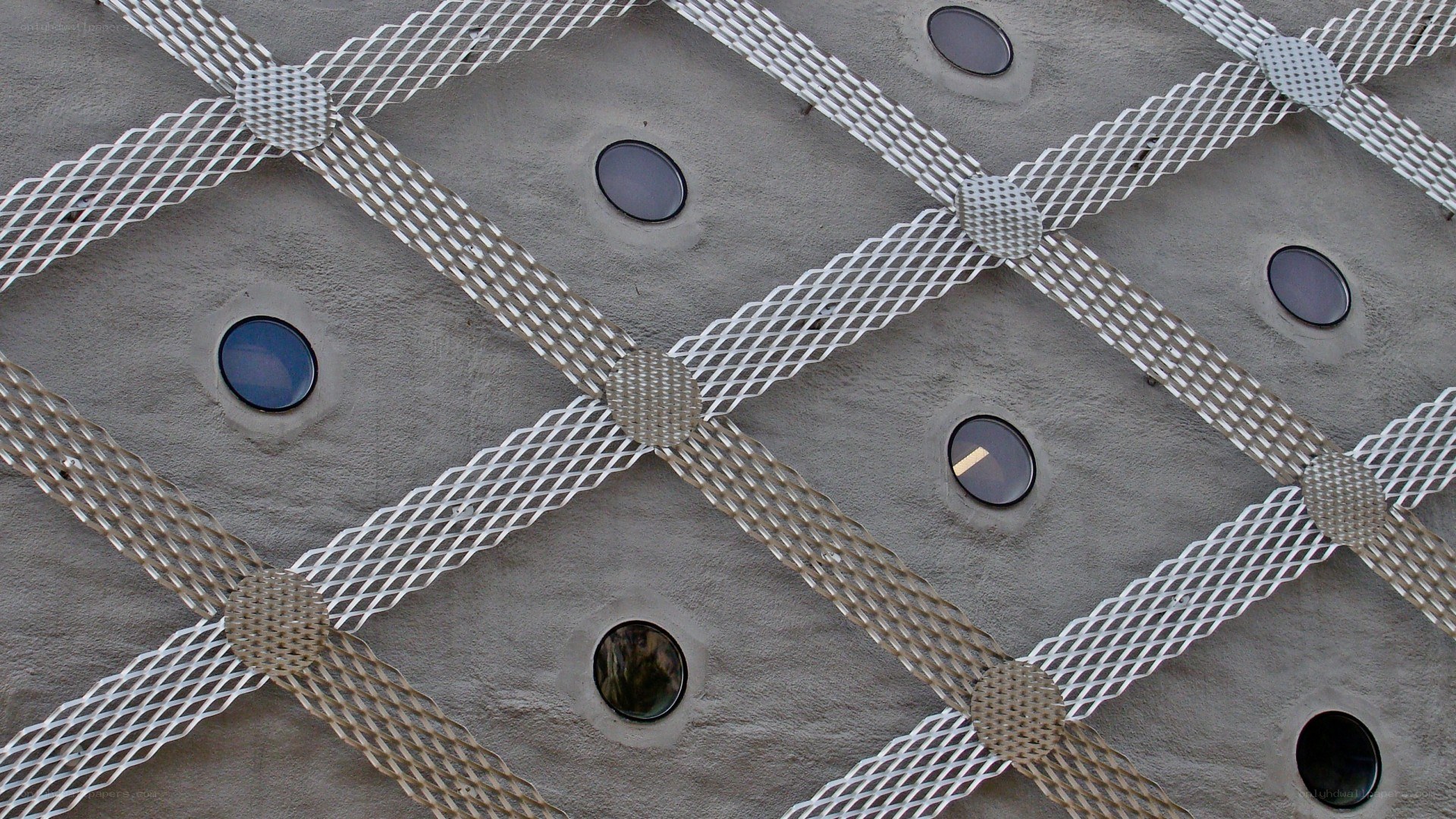 metal mesh on concrete wall