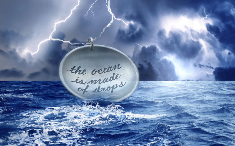 Metal Pendant over Ocean