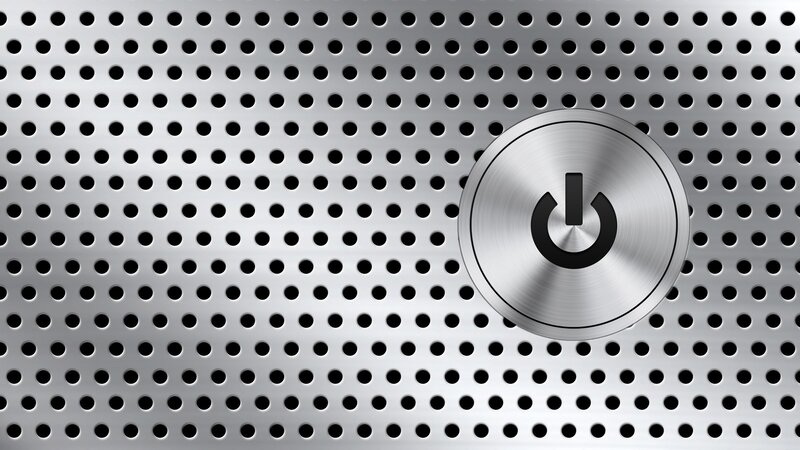 metal perforated surface with power button