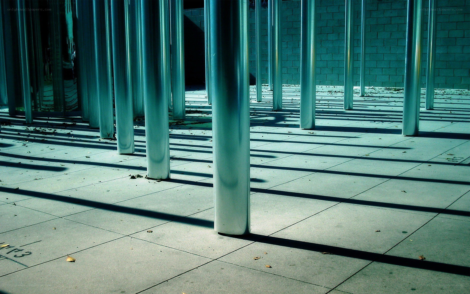 Metal poles casting shadows