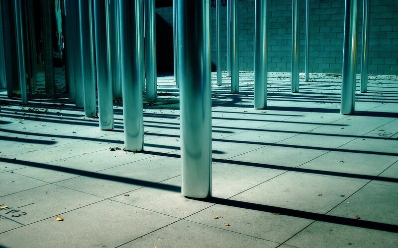 Metal Poles Casting Shadows — Blue