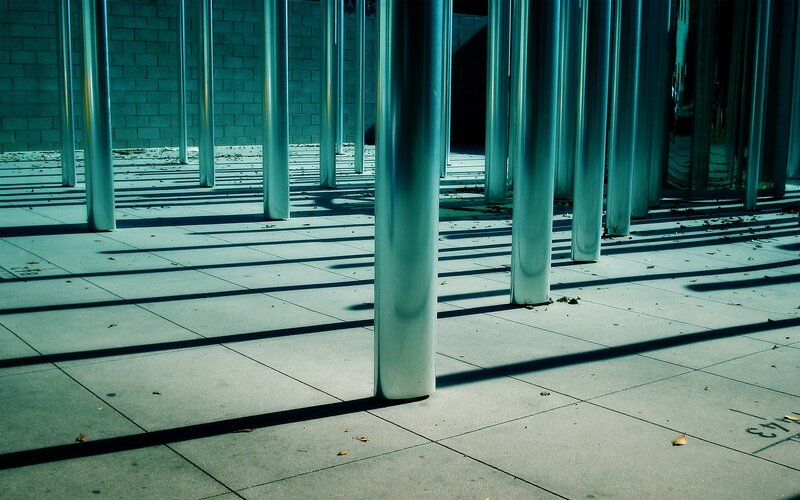 Metal Poles Casting Shadows — Gray