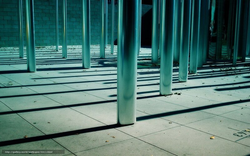 Metal poles casting shadows