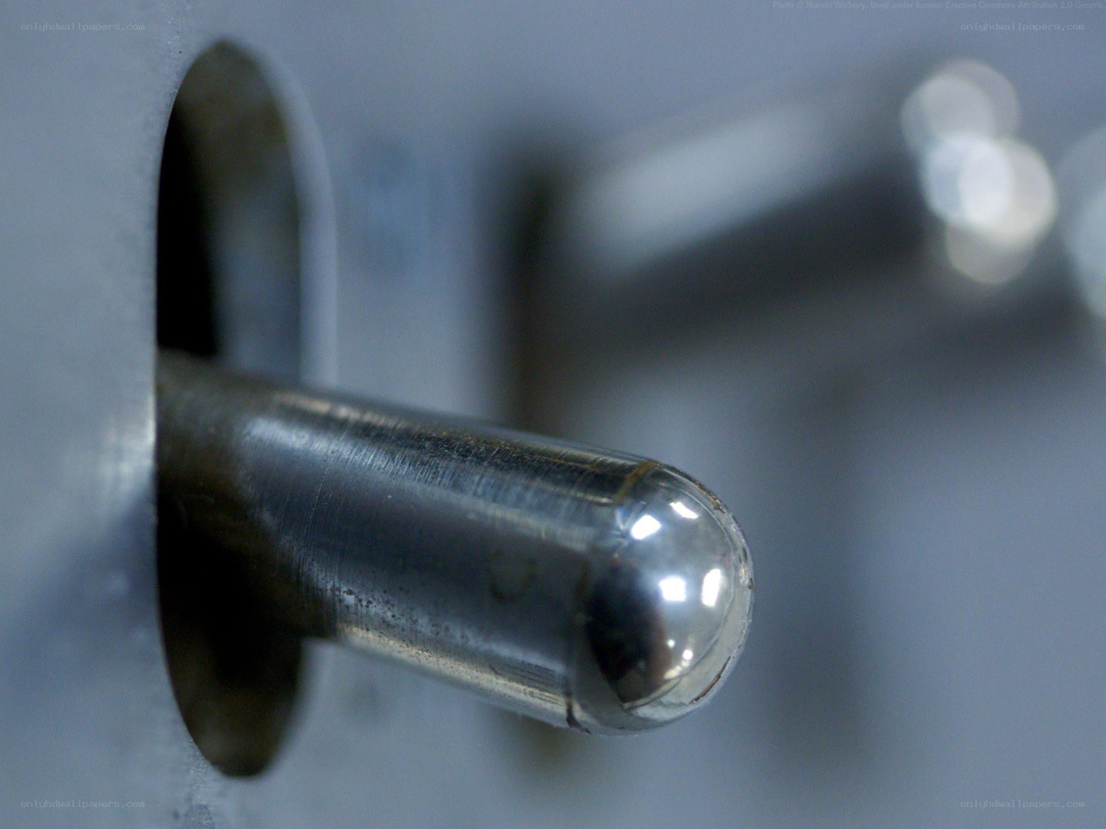Metal rod in a hole