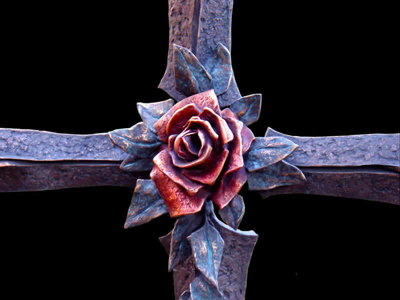 metal rose cross sculpture