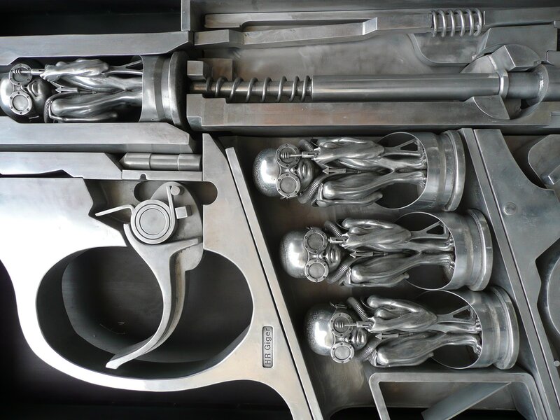 Metal sculpture of alien figures
