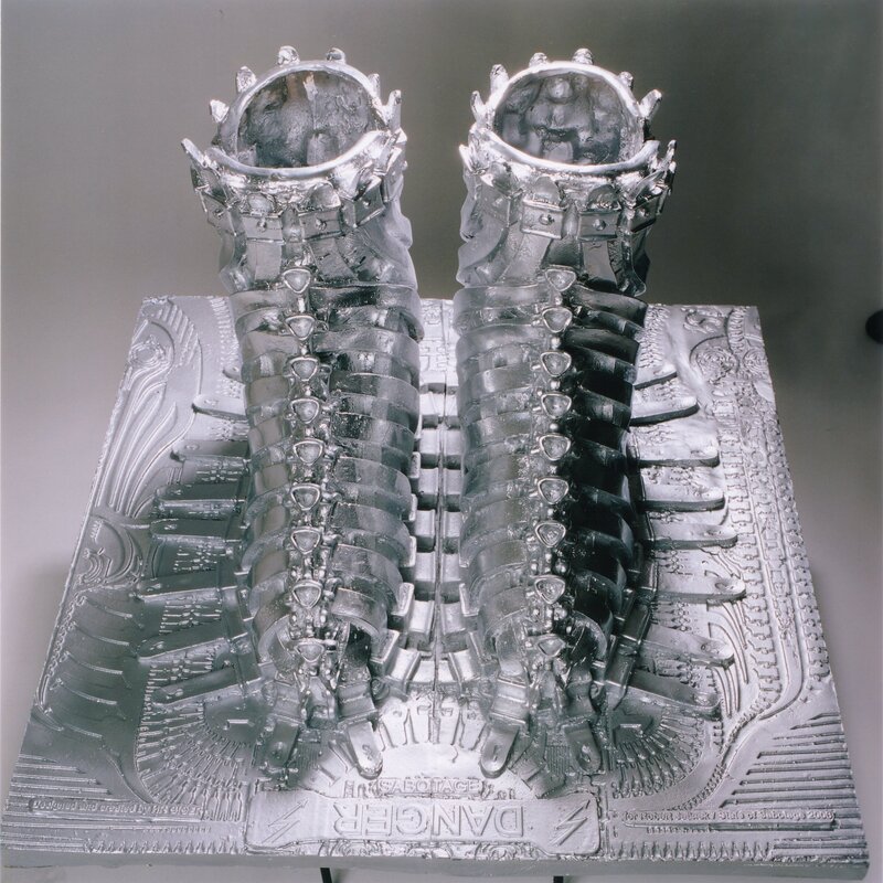 Metal sculpture of boots