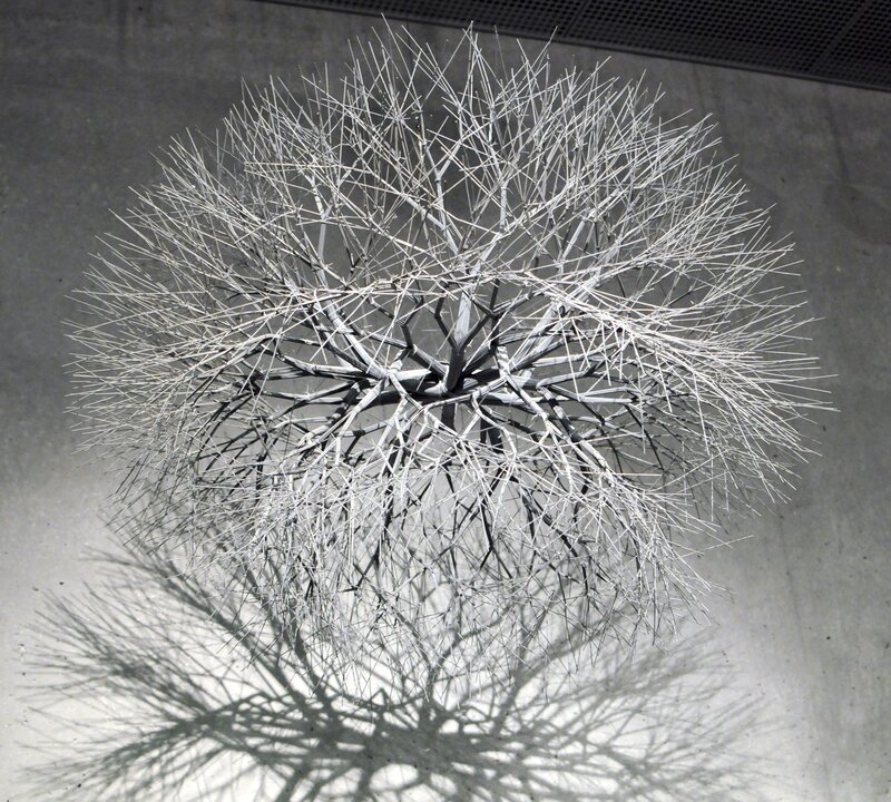 Metal sculpture resembling a dandelion