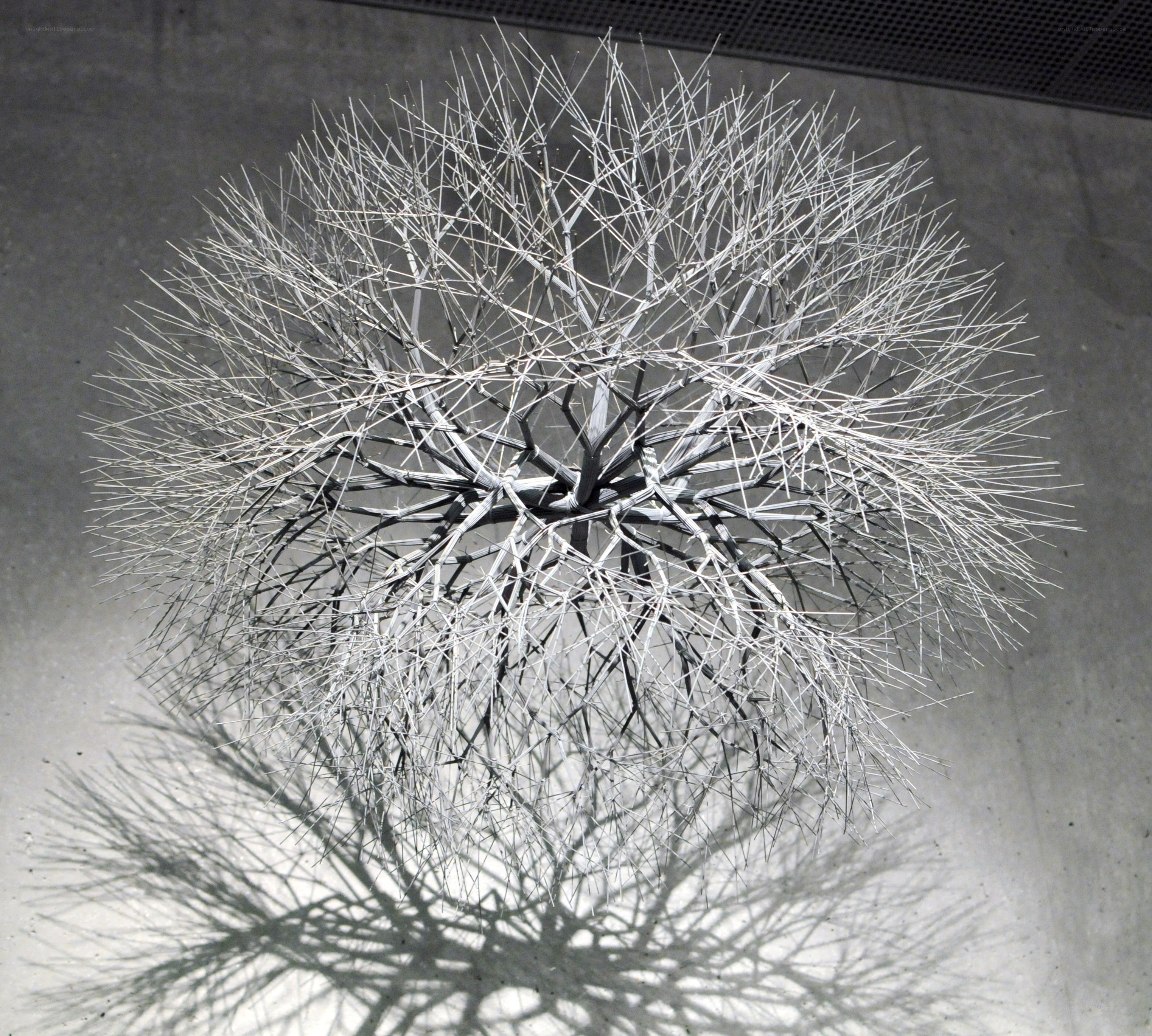 Metal sculpture resembling a dandelion