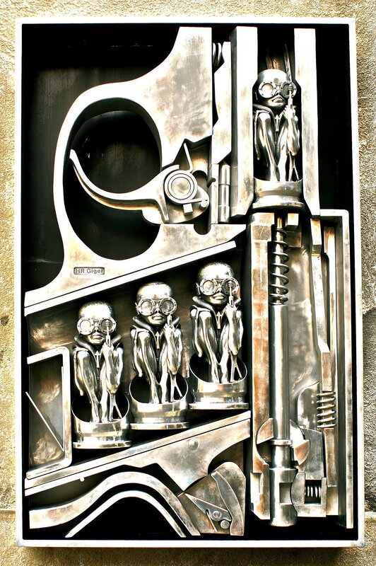 Metal sculpture with alien figures