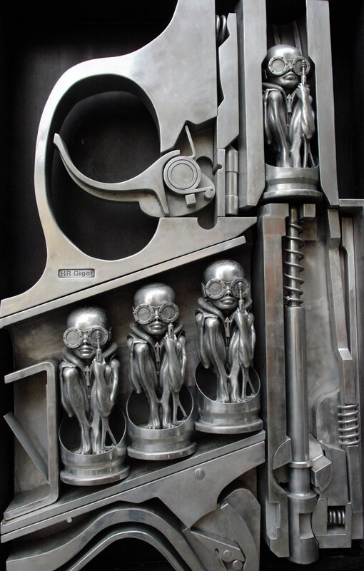 Metal sculpture with alien figures