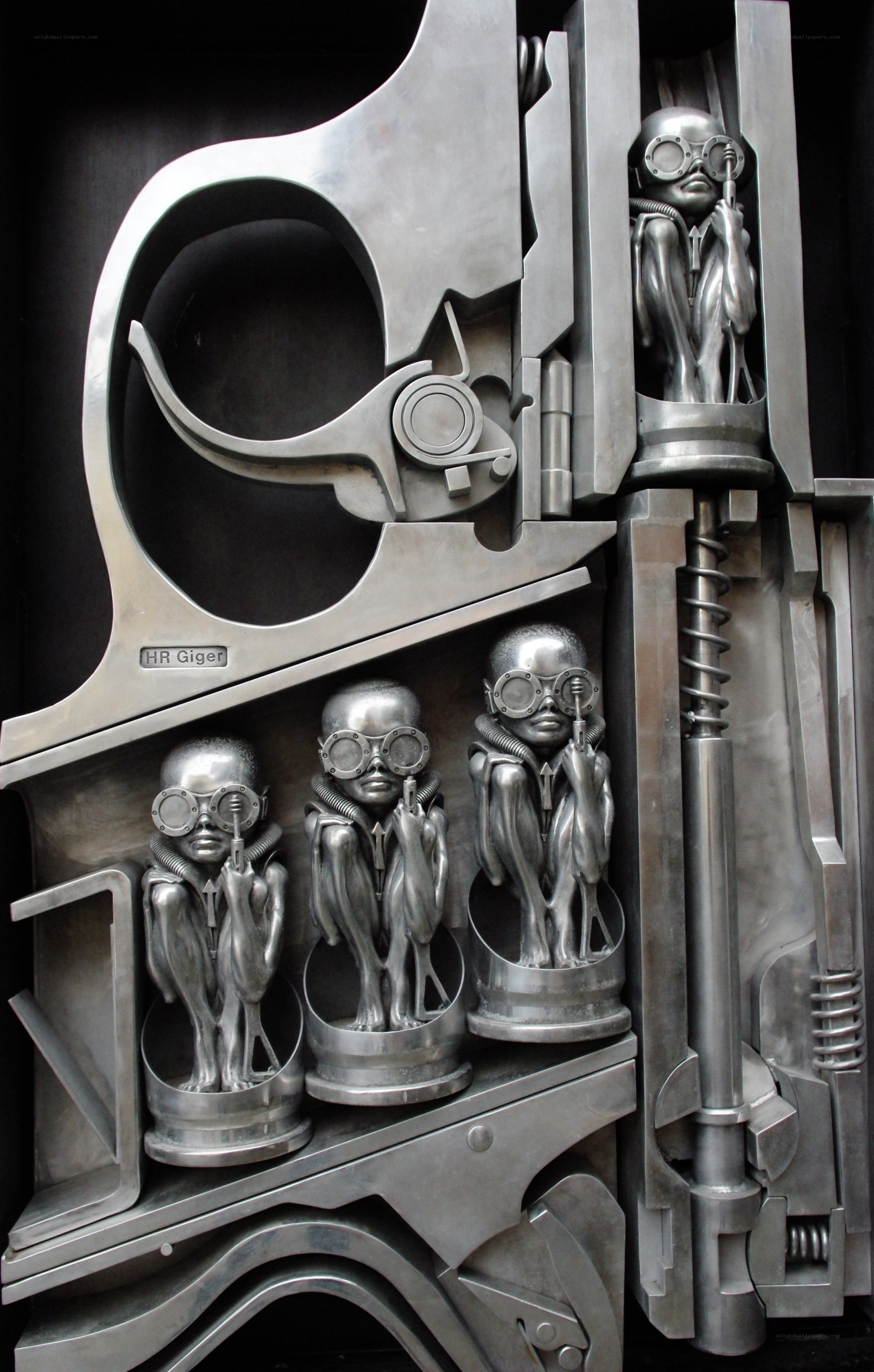 Metal sculpture with alien figures
