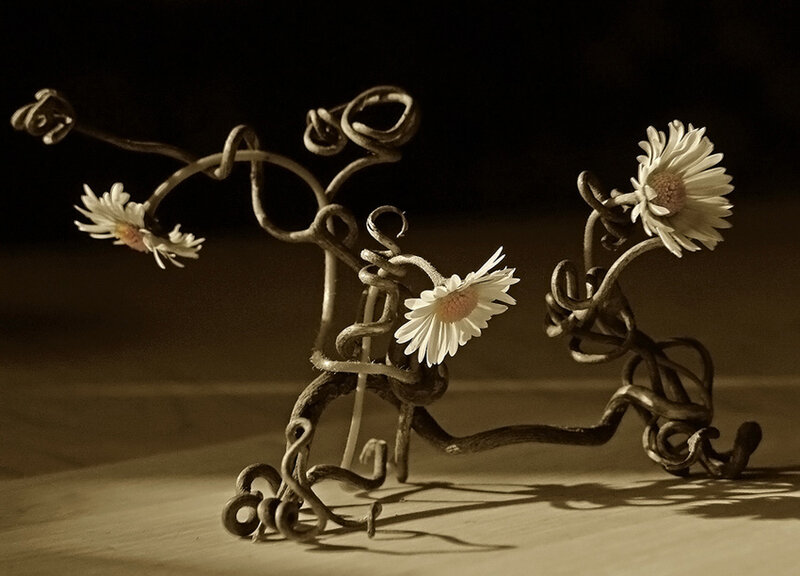 Metal Sculpture with Daisies