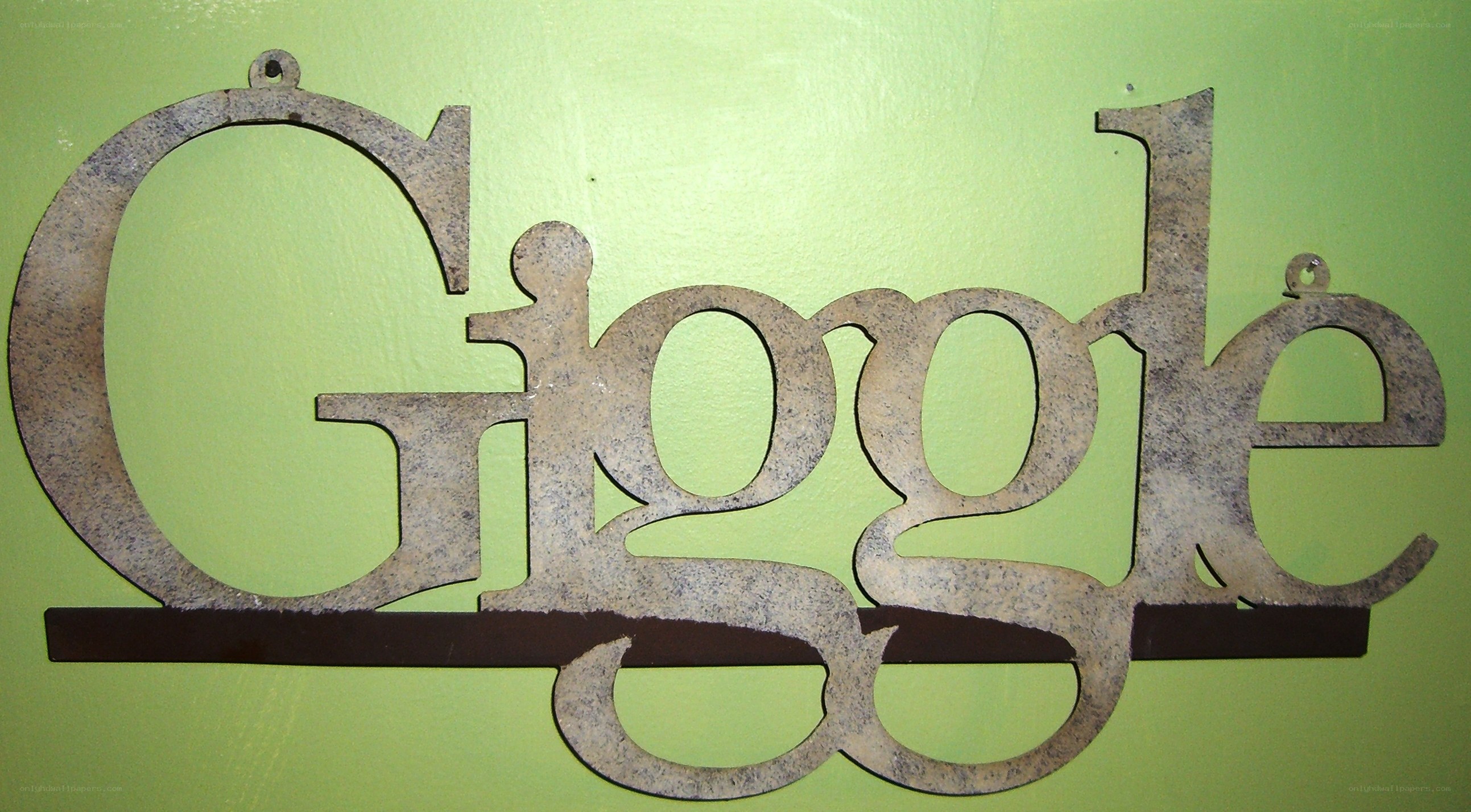 metal sign reading Giggle