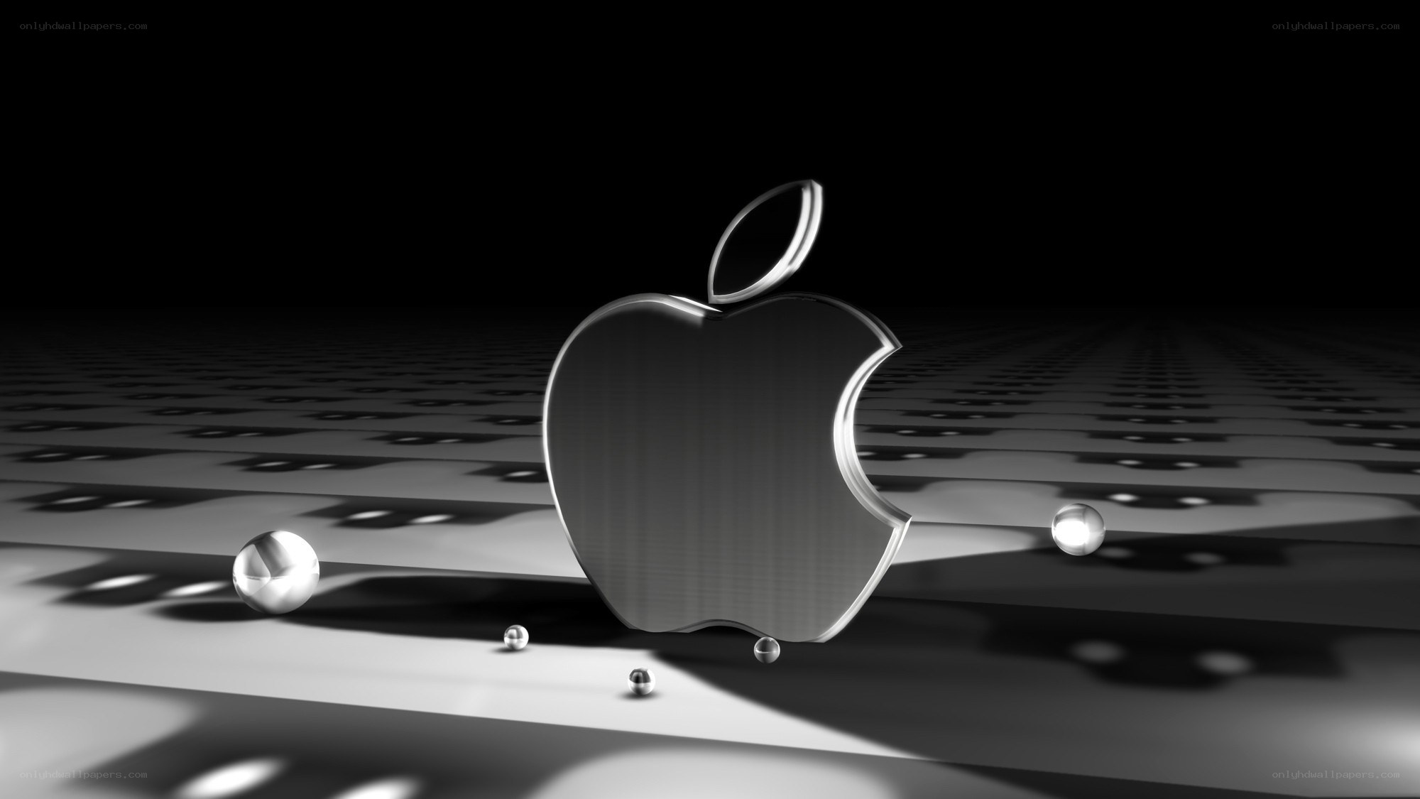 Metallic Apple logo on circuit board