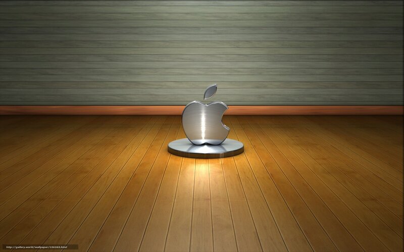 Metallic Apple logo on wood