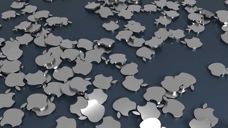 Metallic Apple logos scattered