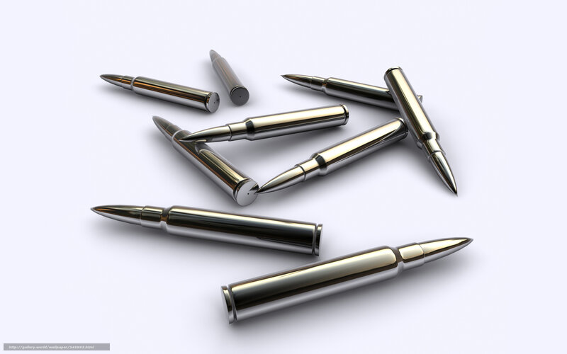 Metallic bullets on white surface