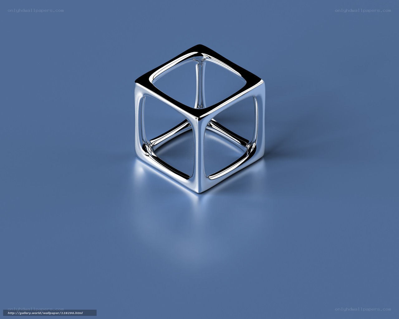 Metallic cube on blue background
