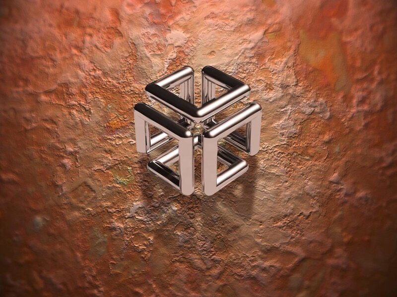 Metallic geometric sculpture on rusted surface