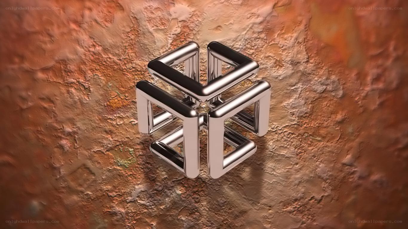 Metallic geometric sculpture on textured surface