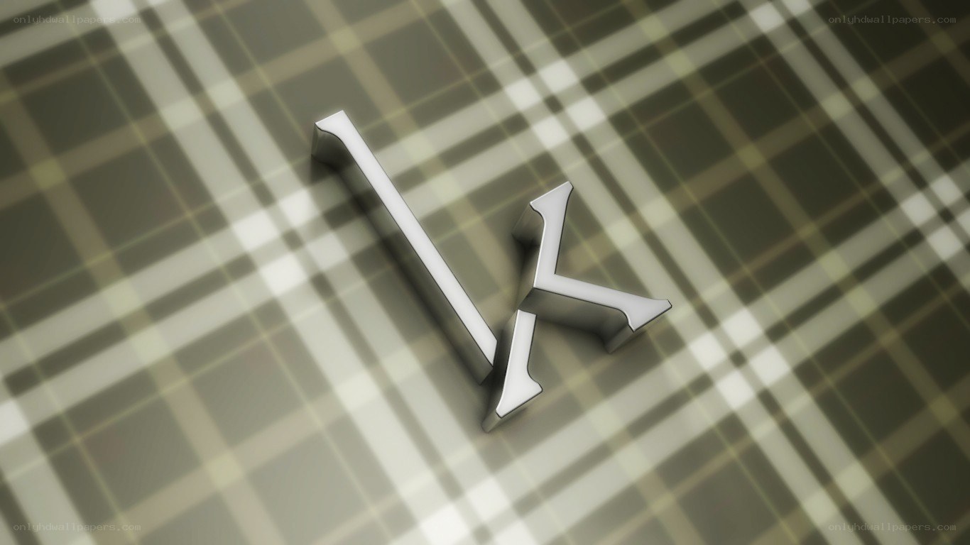 metallic letter k on plaid