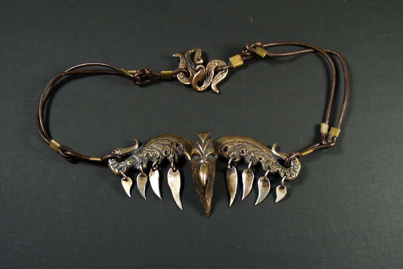 Metallic Necklace with Bird Design