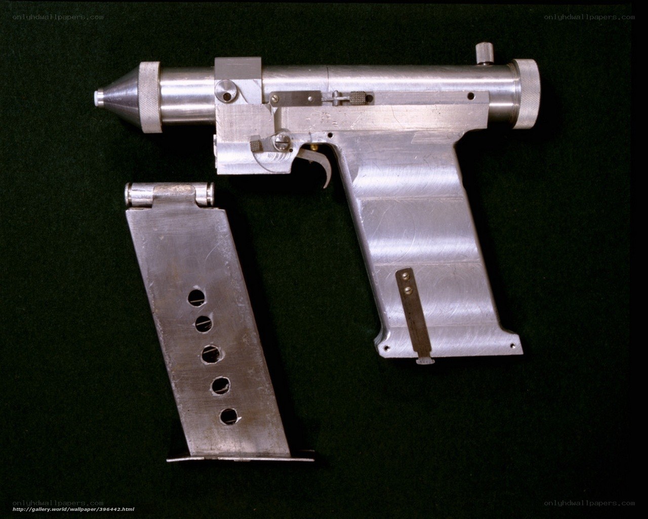 metallic pistol with magazine
