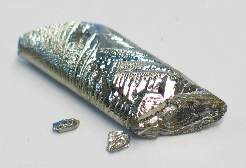 metallic rod with fragments