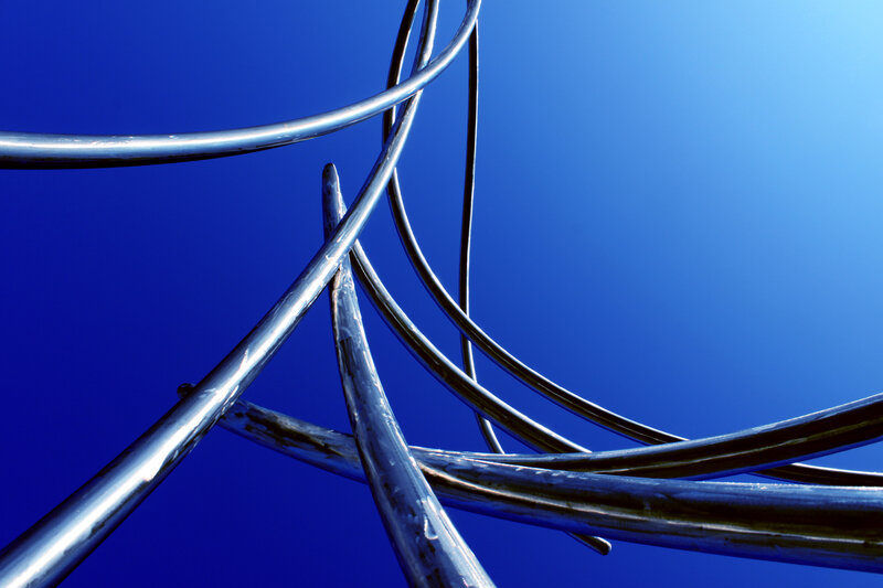 Metallic Sculpture Against Sky