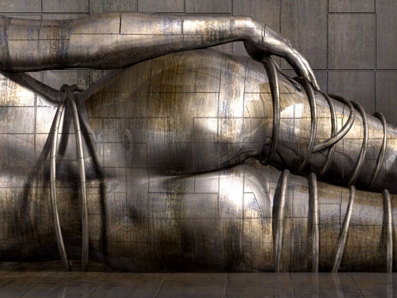 metallic sculpture of intertwined forms