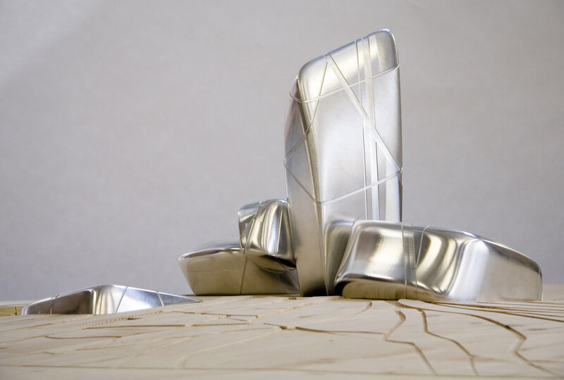 Metallic Sculpture on Wood