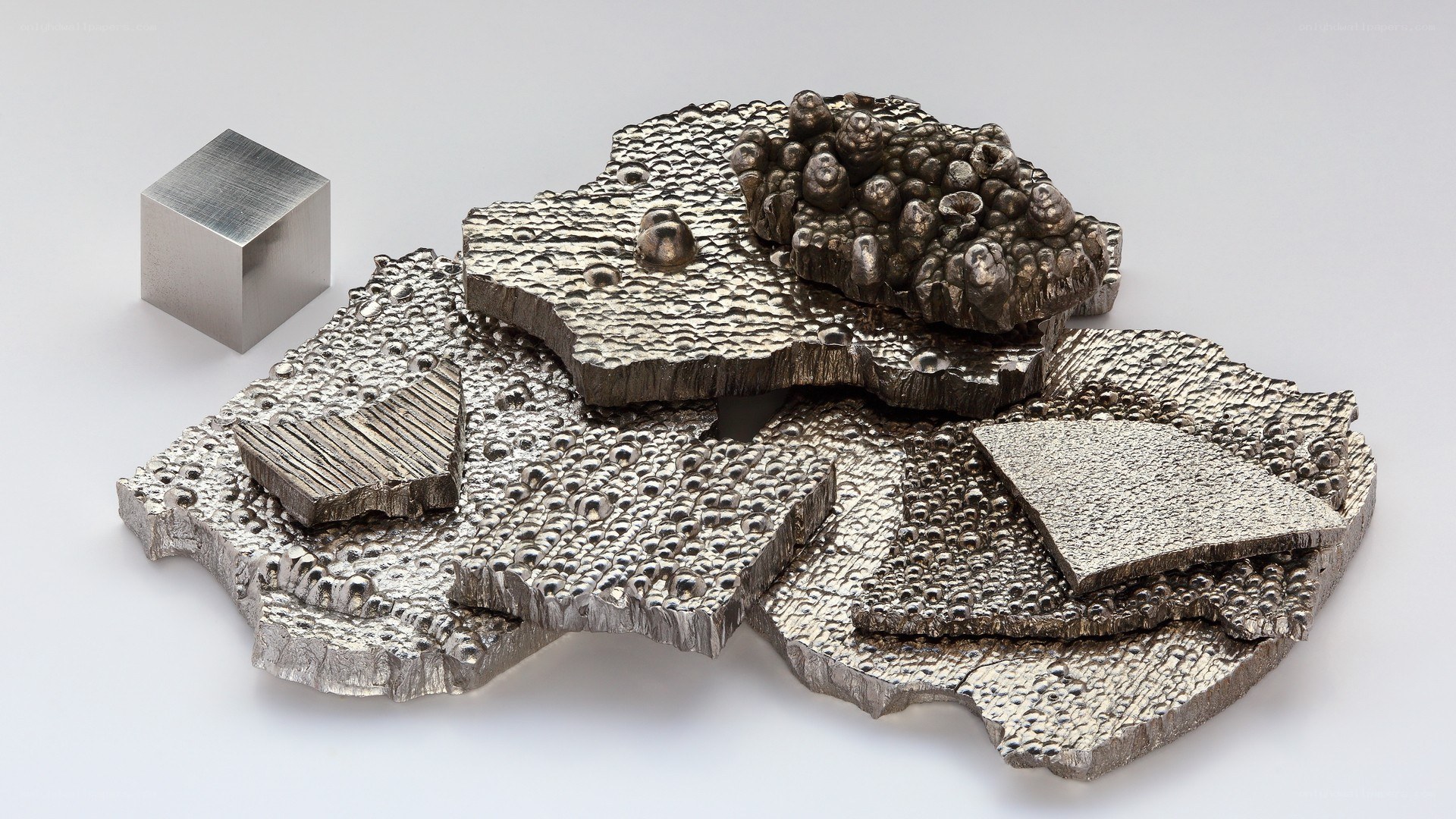 metallic sculptures and cube