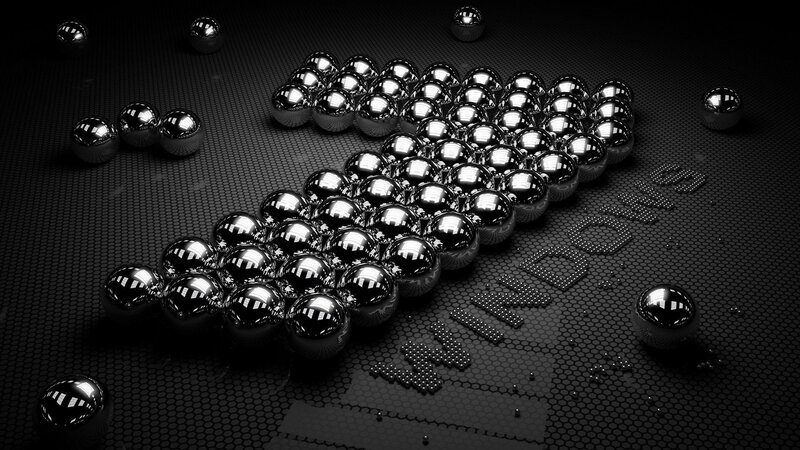 Metallic Spheres Forming Logo