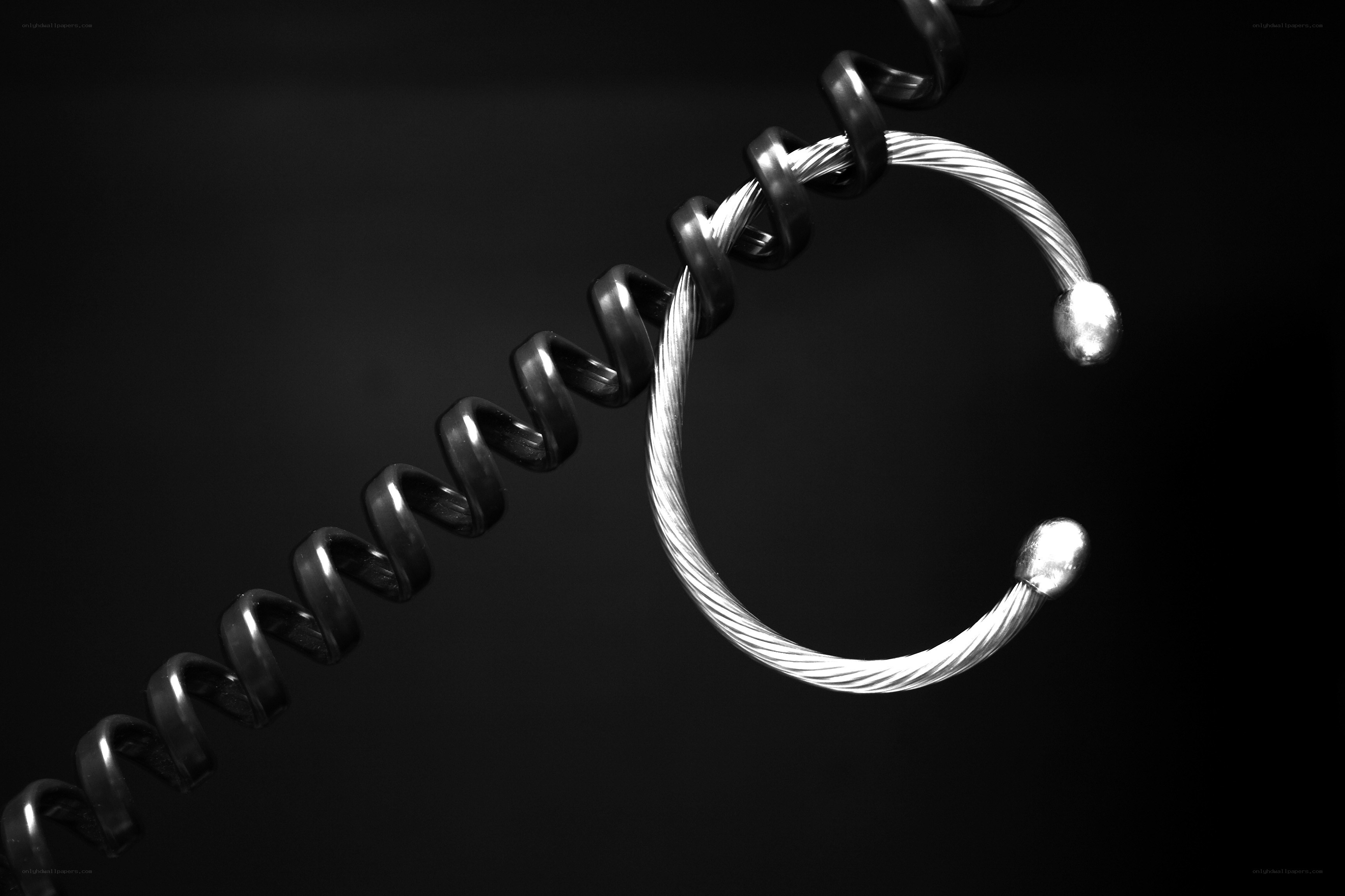 Metallic spiral and cable bracelet