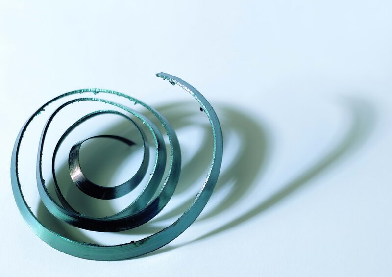 Metallic spiral coil