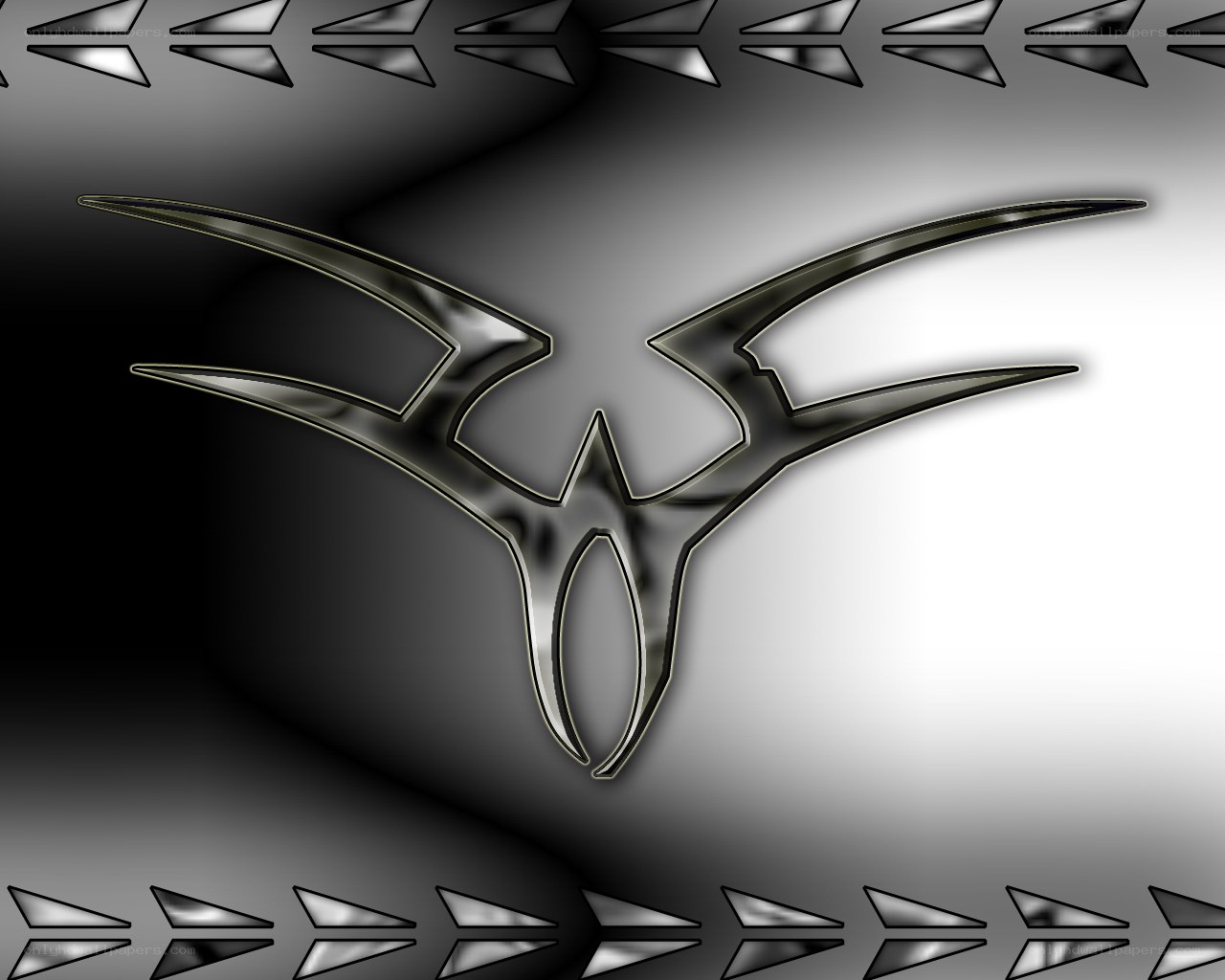 metallic winged emblem