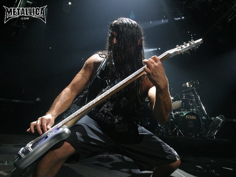 Metallica bassist performing on stage