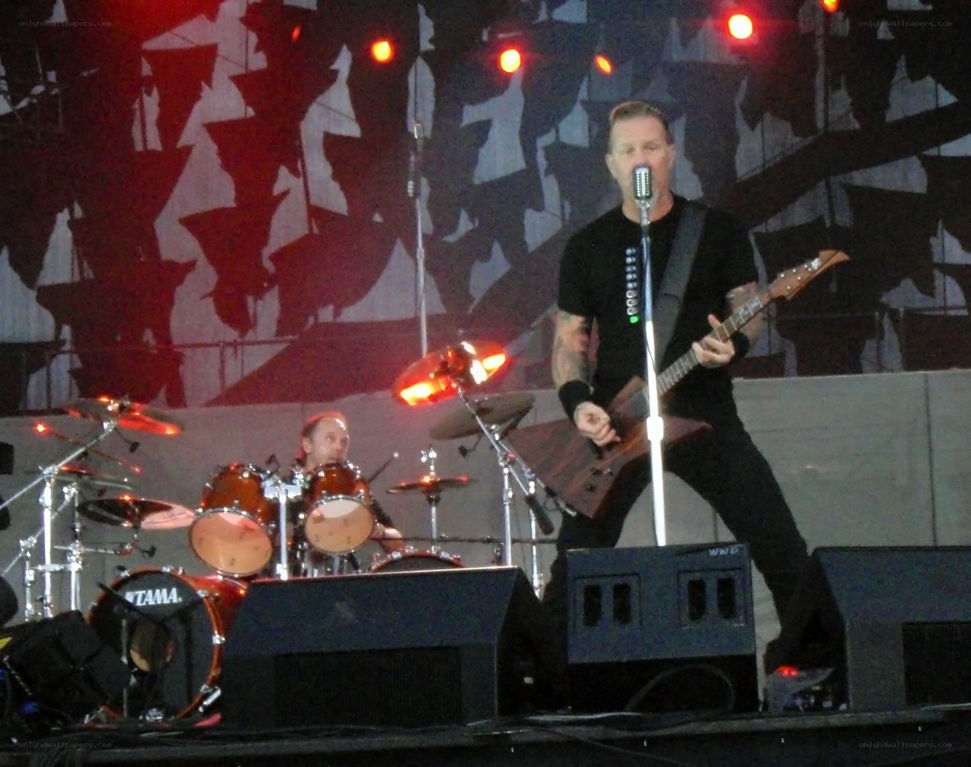 Metallica performing live on stage