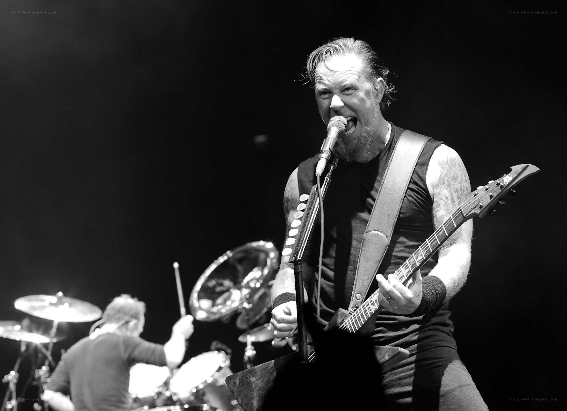 Metallica performing live on stage